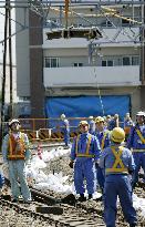 Rails at Amagasaki train crash site confiscated