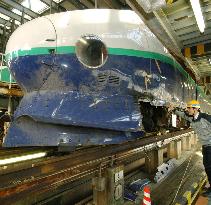 Bullet train derailed in Niigata quake shown to press