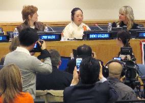 Japanese calligrapher with Down syndrome brings message of hope to U.N.