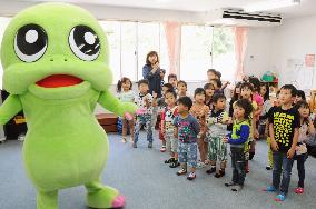 TV mascot character entertains kids at Fukushima child center