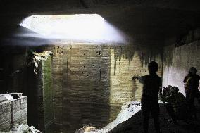 Sunlight comes through hole at former quarry in eastern Japan