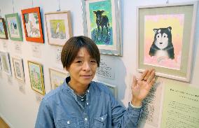 Children's book author exhibits drawings of pets lost in quake
