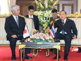 Japan's defense minister meets with Thai counterpart