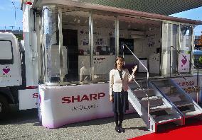 Caravan exhibiting Sharp products