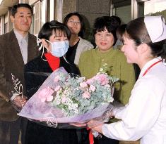 Japan's 1st lung transplant patient leaves hospital