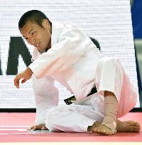 Japan's Ebinuma reacts after loss in world judo tourney