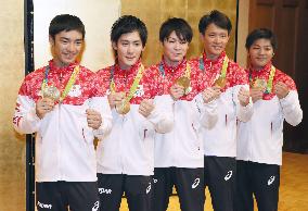 Olympics: Gold-winning Japanese gymnasts return home