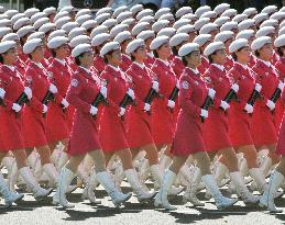 Beijing shows off new weaponry in 60th anniversary parade