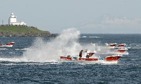 Japanese fishing boats sail for kelp harvesting near northern islet