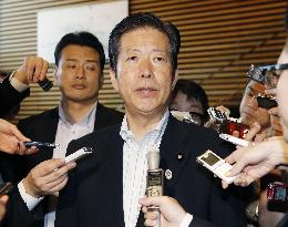 Komeito head receives apology, agrees to seek security bills' passage