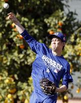 New Dodger Maeda plays catch in spring training camp