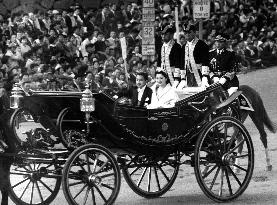 Imperial couple in post-wedding parade in 1959