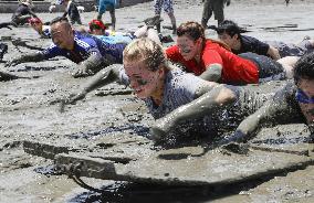 Muddy sports event in Japan