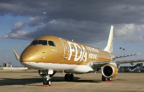 Fuji Dream Airlines unveils fleet's 9th Embraer E-Jet, in gold