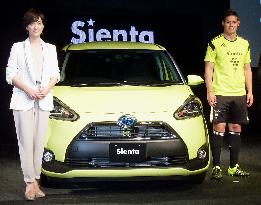 Celebrities pose at Toyota's new minivan presentation event