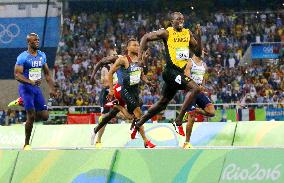 Olympics: Bolt completes 3rd sprint double with 200 win