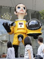 Child statue in protective suit in crisis-hit Fukushima