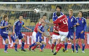 Japan overpower Denmark to cruise into last 16