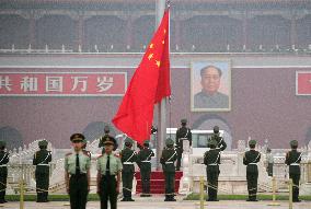 Police keep watch at Tiananmen Square on 17th anniversary