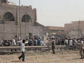 (2) At least 12 killed in blast at Jordanian Embassy in Iraq