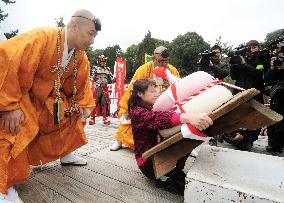 Winner at giant rice cake-lifting contest at Kyoto temple