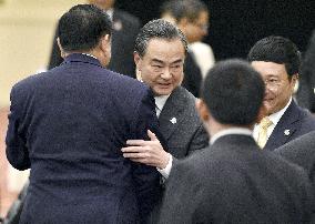 Chinese foreign minister greets Thai counterpart in Malaysia