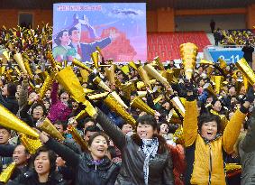 N. Korean spectators cheer for friendship soccer game