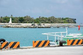 Taiwan-controlled islet in S. China Sea shown to foreign media
