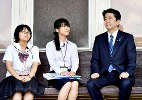Japan PM Abe visits city hit by 2011 earthquake and tsunami
