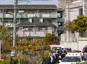 Man locks himself in building in Tokyo suburb, fires outside