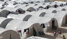 Syrian refugees find shelter in Suruc camp in Turkey