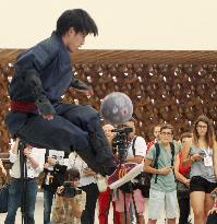 Japanese man in ninja outfit performs at Milano Expo