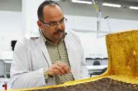 King Tut's gold-plated bed undergoes preservation work