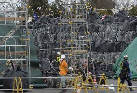 Storage site of contaminated soil open to media