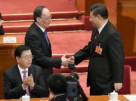 Xi re-elected as China's president, his confidant becomes No. 2