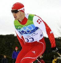 Cologna claims gold in men's cross-country 15km freestyle