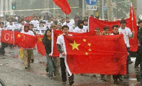Chinese march over Japanese takeover of Senkaku lighthouse