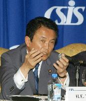 Aso urges China to democratize, warns against nationalism