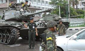 Military seizes power in Thailand in coup, ousts Thaksin