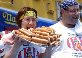 Kobayashi wins hot dog eating contest for 3rd straight year
