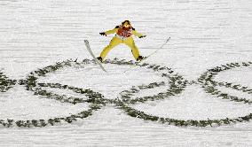 Japan's Kasai flies above Olympic logo in large hill jump