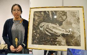 Woman "squid painter" holds exhibition in northern Japan
