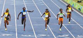 Olympics: Thompson wins women's 100