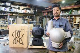 Antiques-style potbelly stoves find niche market in Japan