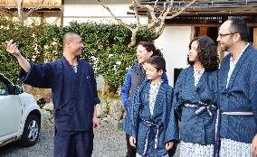Foreigners experience Buddhist monk life at Mt. Koya heritage site
