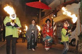 Man as bride, woman as groom event in Yamagata