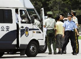 Police keep watch at Tiananmen Square on 18th anniversary