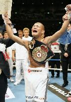 Kameda wins WBA light flyweight crown in split decision