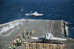 U.S. Navy practices aircraft take-off, landing on Kitty Hawk