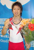 Japan's Ueyama gets bronze at worlds, Olympic berth